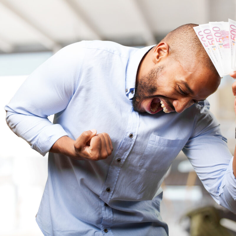 black-businessman-happy-expression-scaled